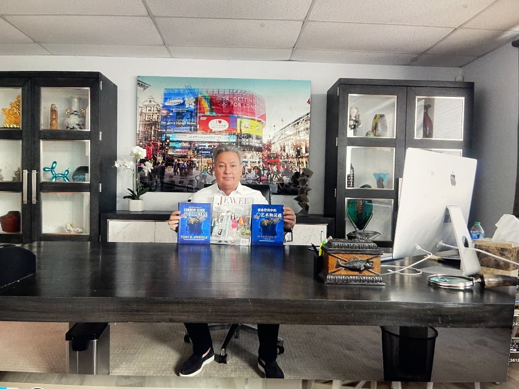 Tory R. Zweigle at his desk